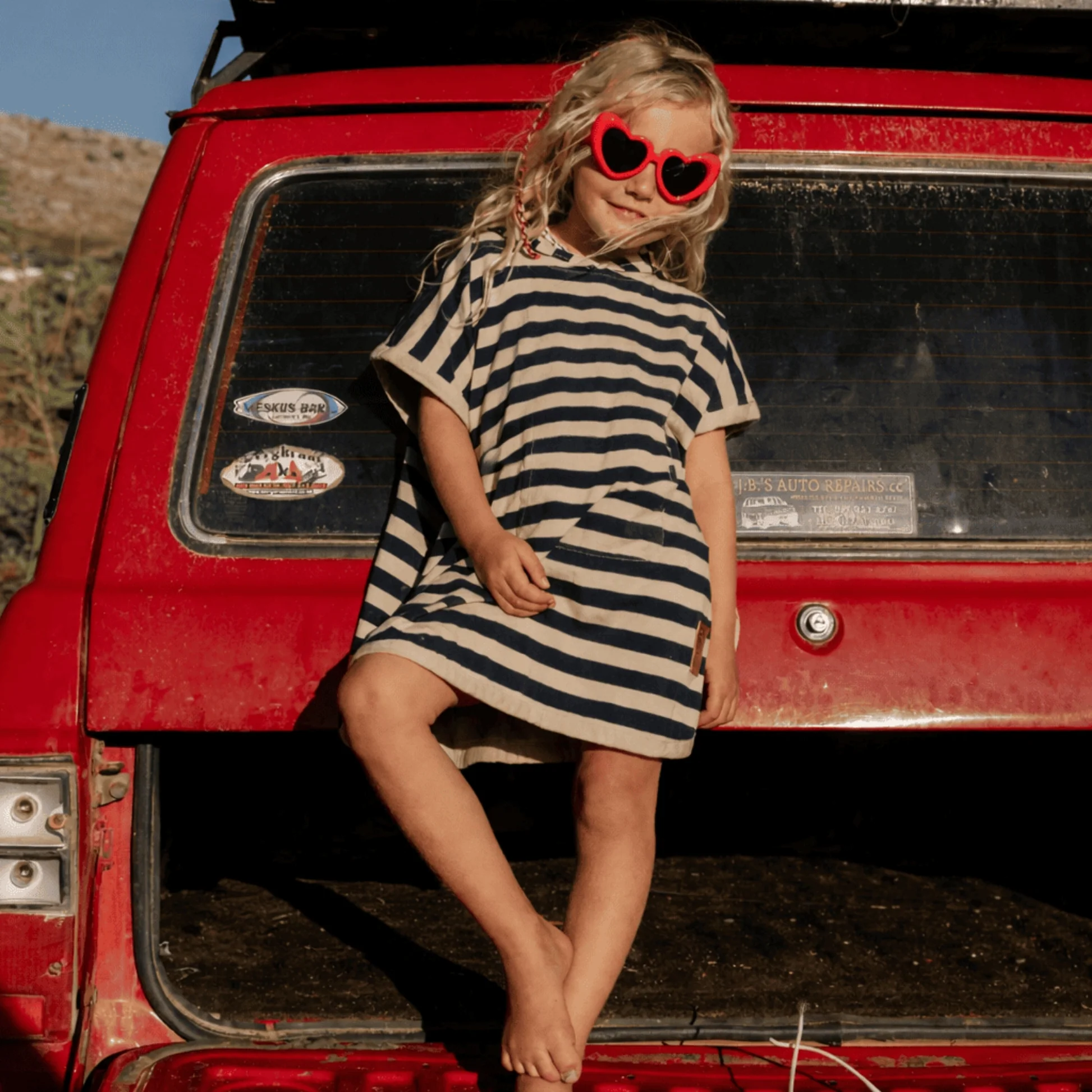 UV_Kids_Poncho_in_Sandy_Navy_Stripe.jpg